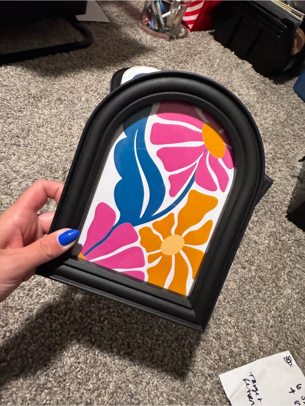 Black Arched Frame Wall Accent with Pink, Blue and Yellow Floral Art